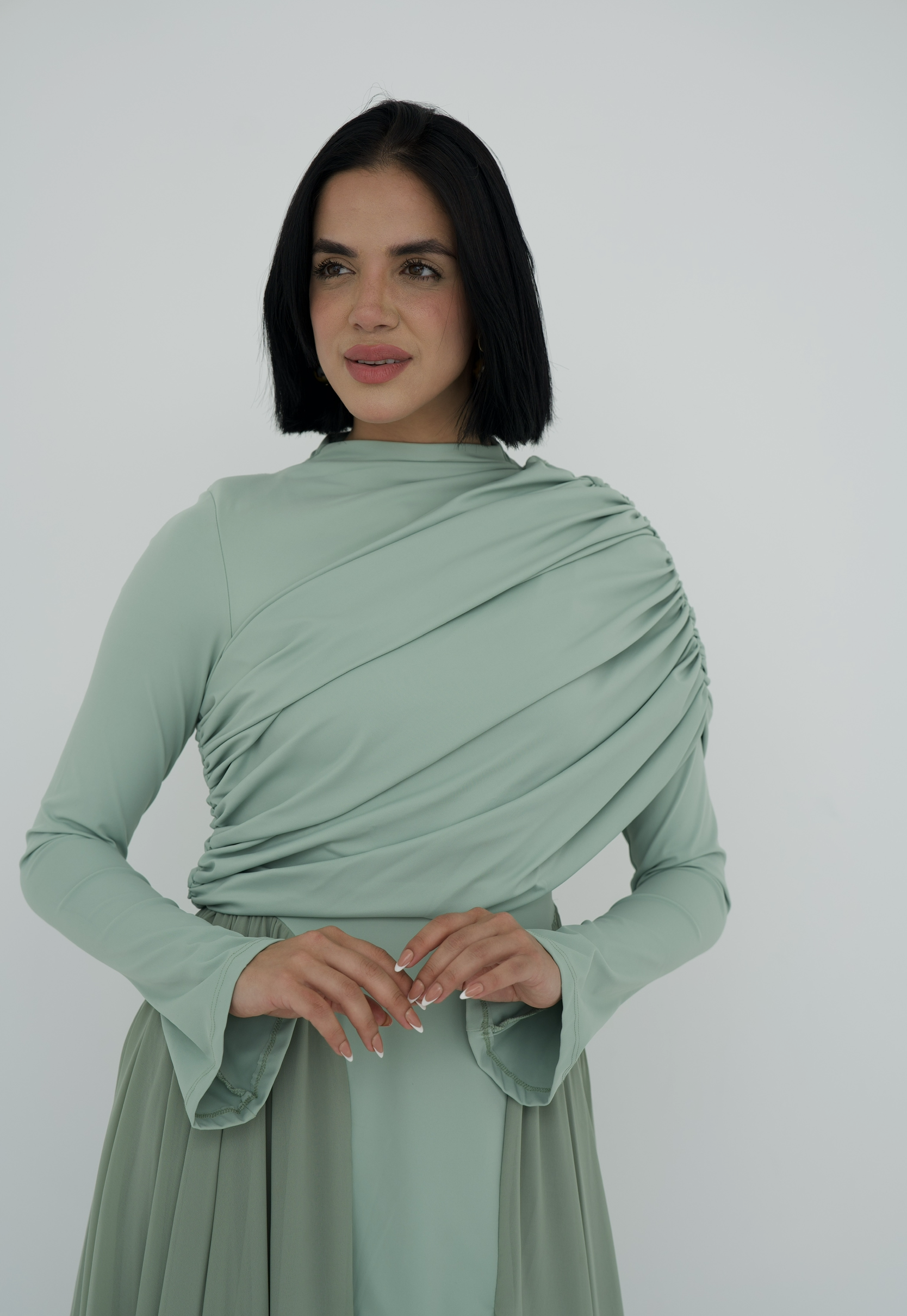 Amwaj gown with shoulder drappes in Mint with chest cover