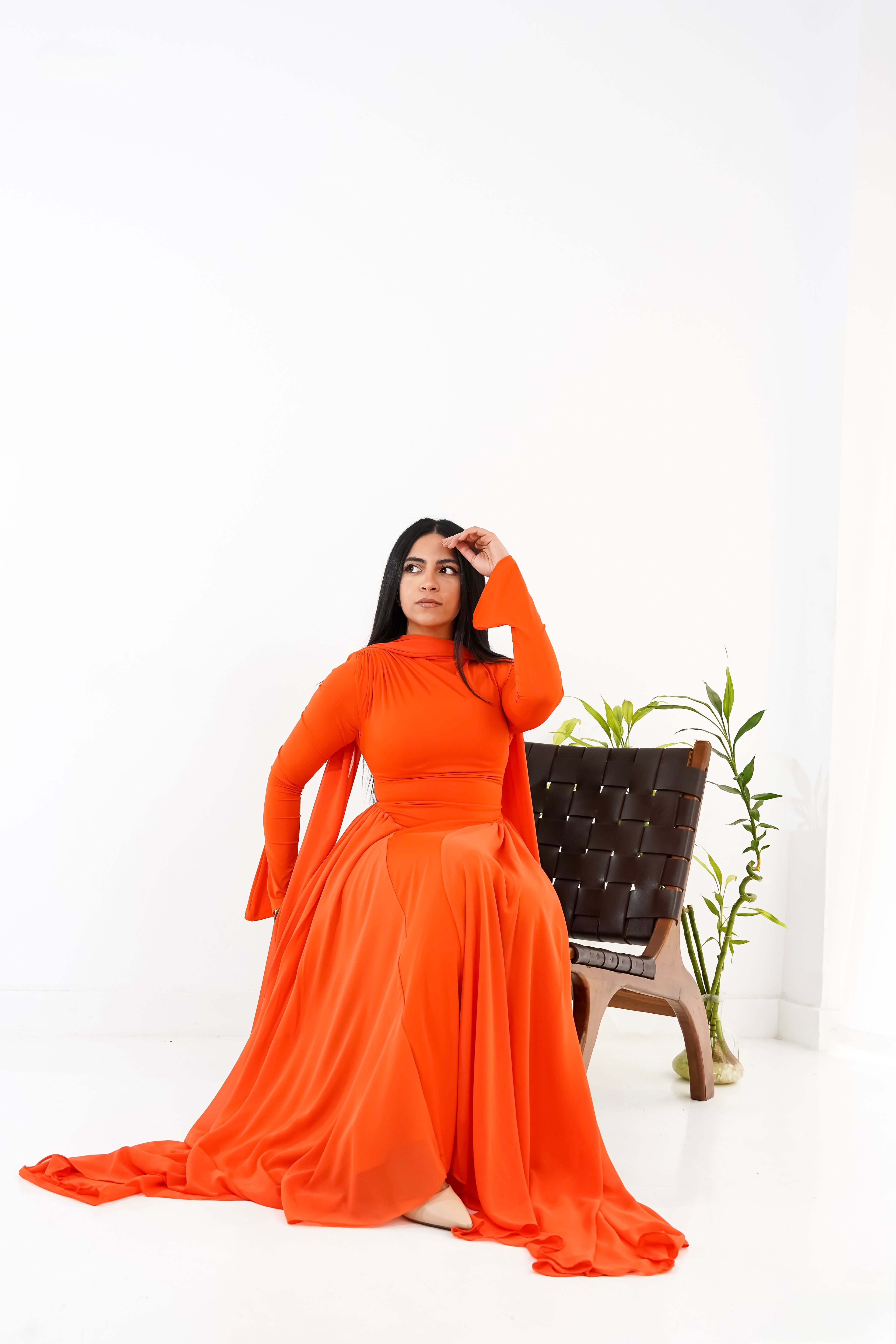 Amwaj gown with shoulder drappes in Orange with cover chest