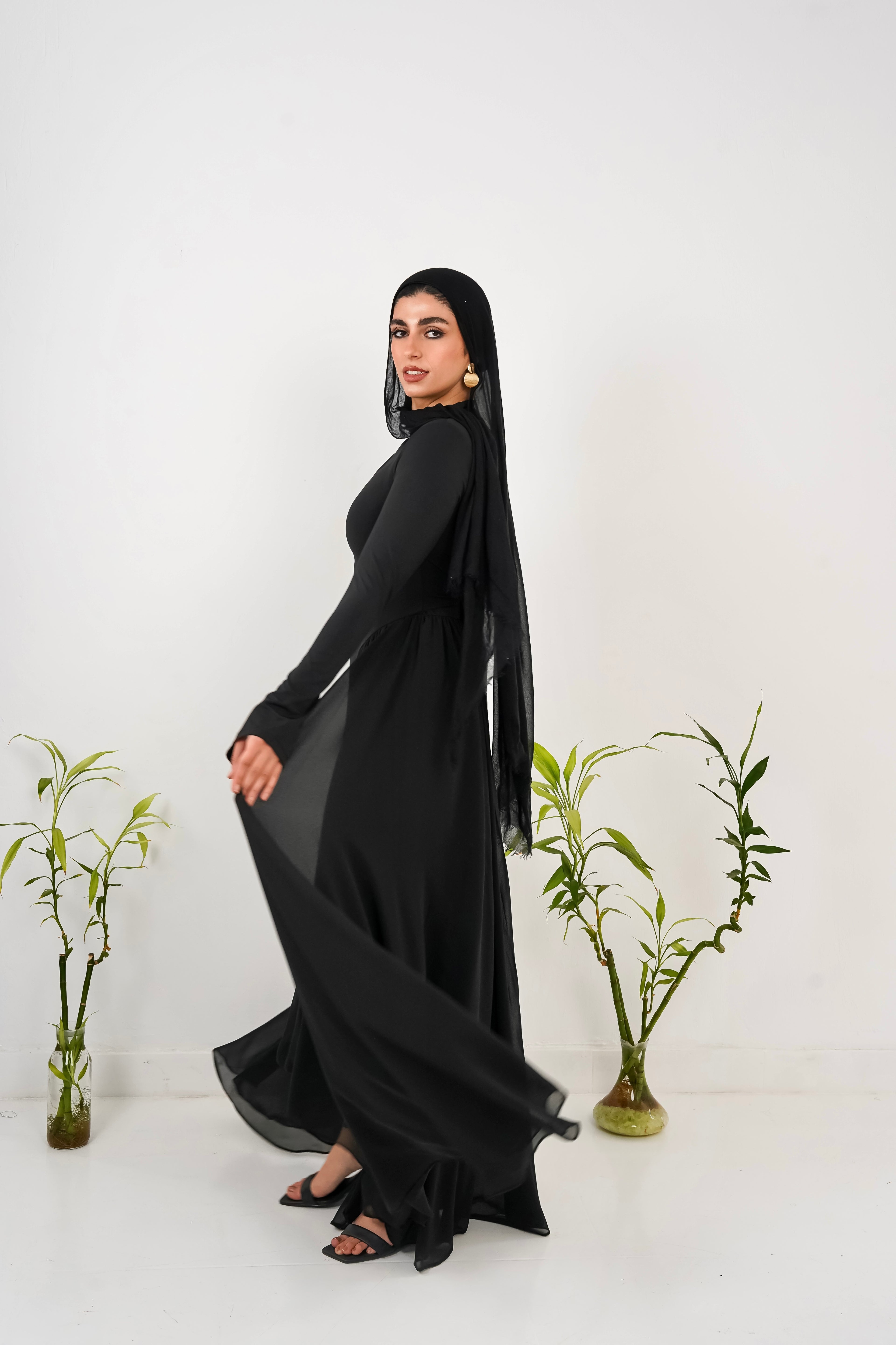 Amwaj gown with shoulder drapes in Black with chest cover