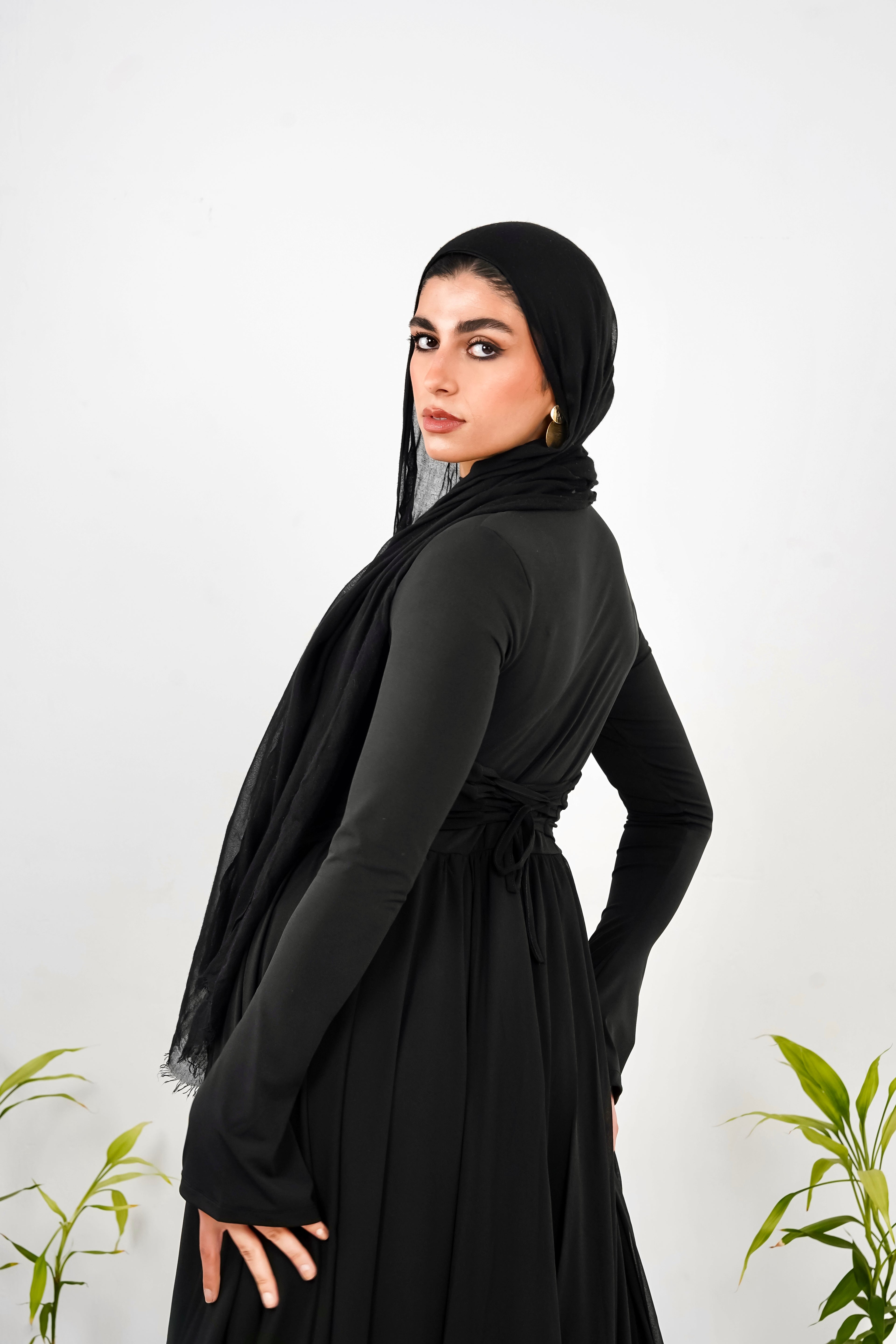 Amwaj gown with shoulder drapes in Black with chest cover