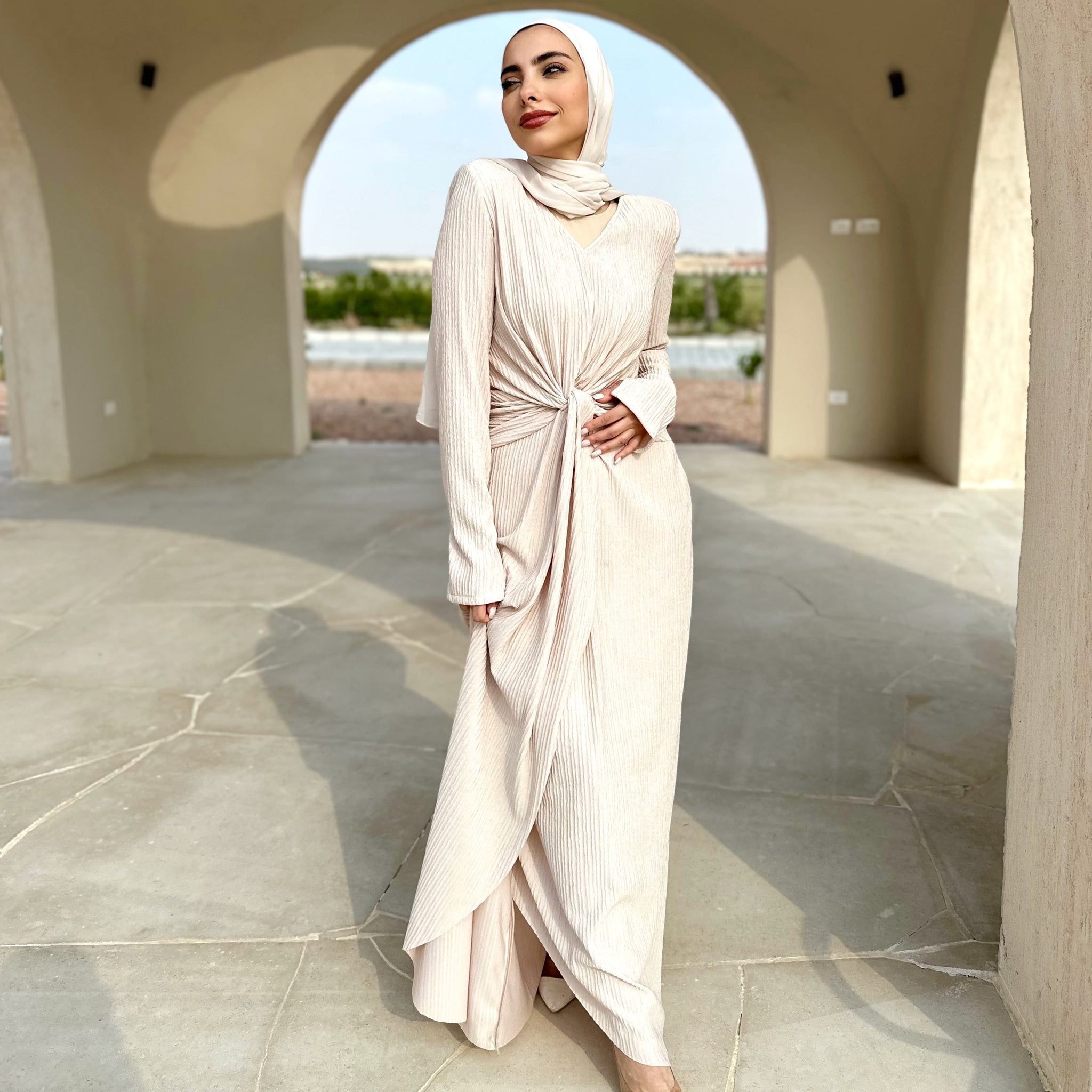 twisted knot maxi dress in beige  Safa ghaly