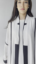 Load and play video in Gallery viewer, Linen striped Abaya in White
